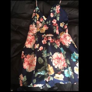 Navy Blue Floral Romper. NWT Never Worn.